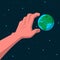 Earth globe in space and hand reaching out for it. Vector concept illustration of earth planet globe in dark space background and