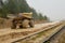 Earth mover loading dumper truck with sand in quarry. Excavator loading sand into dumper truck.Quarry for the extraction of minera