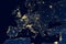 Earth at night, view of city lights showing human activity in Europe from space. EU and Mediterranean on world dark map on global