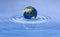 Earth planet on water wave ripples