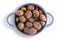 Earthenware bowl of fresh roasted chestnuts