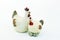 Earthenware little rooster and hen with eggs