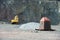 Earthmover in an active quarry mine of porphyry rocks. digging.