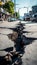 Earthquake cracked street in city