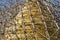 After an earthquake, the damaged, golden stupa of a pagoda in Bagan