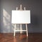 Easel and blank white canvas in bright interior. 3d rendering