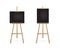 Easel standing with black boards set. Blank blackboard on wooden tripod for art, painting, drawing or announcement