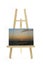 easel with sunset photo