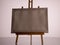 Easel white canvas stand on white background straight