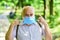 Easing of lockdown restrictions. Mask protecting from virus. Older people highest risk covid-19. Wear mask. Quarantine