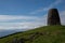 Eask tower with cloudy blue sky