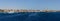 East dock blue sea and big luxury yachts panorama