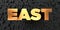 East - Gold text on black background - 3D rendered royalty free stock picture