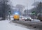 East Midlands Ambulance Service 999 emergency response blue lights severe weather heavy snowfall icy road NHS paramedic driving