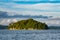 East Misool, group of small island in shallow blue lagoon water at sunset