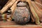 East still-life with ethnic oriental ornaments carpets and an old broken ceramic vase