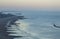 Eastbourne, East Sussex, England - the sea, sky and the pier at dusk.