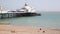 Eastbourne pier with beach and waves