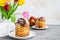 Easter background. Easter cake - Cruffin, Kraffin or Kulich with chocolate nut cream and sugar glaze on top