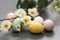 Easter background with eggs and branch with flowers
