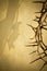 Easter background illustration with Crown of Thorns on Parchment Paper and Jesus Christ on the Cross faded in.