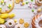 Easter background with marzipan eggs, mazurek pastry, yeast cakes, spring flowers