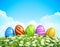 Easter Background with ornate Easter eggs on meadow.