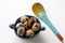 Easter background: quail eggs in bowl and spoon