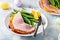 Easter baked ham served on a plate with green beans