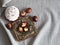 Easter baking with Easter eggs dyed with onion husks with imprints of fresh leaves, on a fabric canvas background. We meet Easter