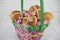 An Easter basket gift filled with food and chocolate eggs