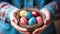 Easter basket preparations hands arranging colorful eggs, candies, and toys, softly illuminated