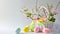 An Easter basket steals the spotlight, meticulously arranged against a clear