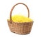 Easter basket with yellow paper filler isolated on white