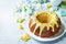 Easter Bundt cake with colorful topping and Easter Cookies