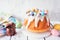 Easter bundt cake decorated colorful chocolate candy eggs.