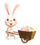 Easter bunny carrying cart with colorful decorated Easter eggs - isolated on white background