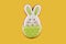 Easter bunny cookie covered with green and white glaze
