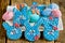 Easter bunny cookies, homemade painted gingerbread biscuits in glaze shaped funny rabbits for Easter