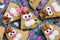 Easter bunny cookies scones decorated with cream and almonds like a funny bunnies face