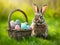 The Easter bunny sits next to a vibrant assortment of eggs and a bouquet of tulips