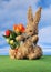 Easter bunny from straw with flower decoration