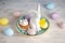 Easter cake, Easter bunny and eggs with flower on a wooden background. Happy Easter concept