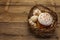 Easter cake, rabbits and eggs in wicker basket. Traditional Orthodox festive bread