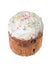 Easter cake with raisins and white cap made of icing and colored powder isolated