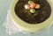 Easter cake with tea matcha decorated chocolate ganache and sweet-stuff eggs