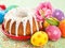 Easter cake, tulip and colorful eggs