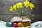 Easter cakes, and Easter eggs, a bouquet of yellow daffodils