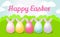 Easter card. On a green field are decorated eggs with protruding ears.
