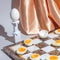 Easter chess play with fresh and boiled eggs